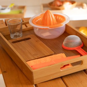 exprimir naranja crianza Montessori